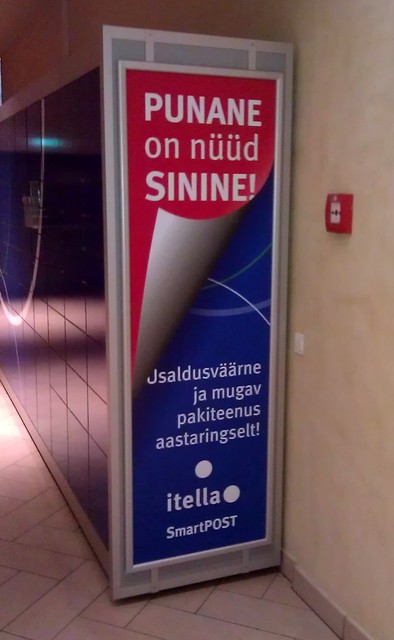 Itella mainoskyltti sisätiloihin