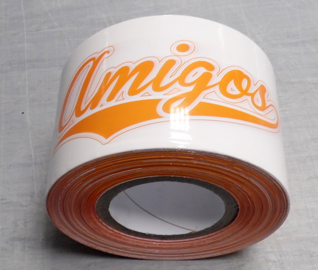 Rajoitusnauha logolla Amigos Rajoitusnauha logolla Amigos