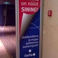 Itella mainoskyltti sisätiloihin